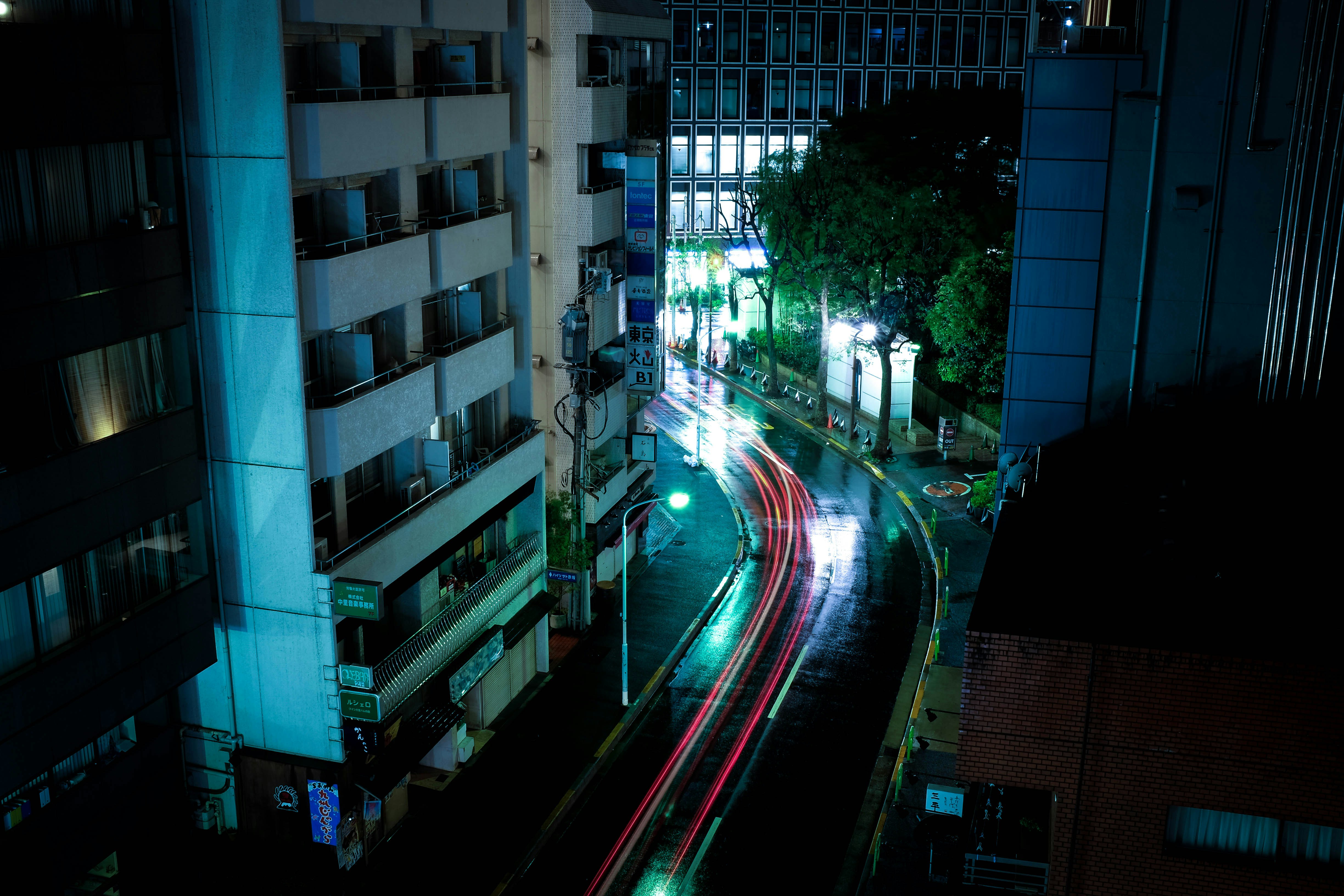 time lapse photography of cars along road
